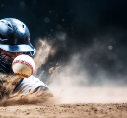 Man trying to catch baseball ball