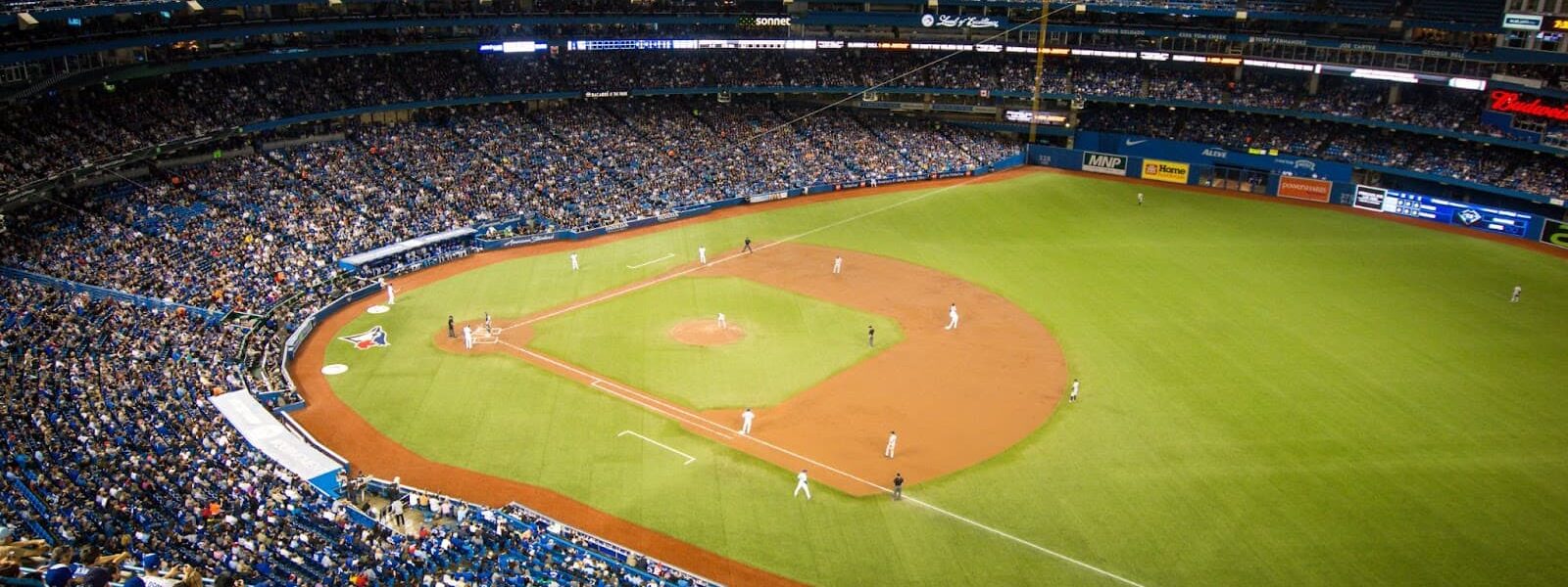 Bird view of baseball stadium and players in the field