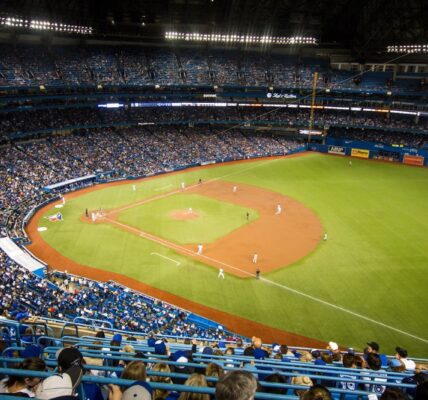 Bird view of baseball stadium and players in the field