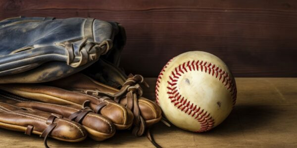 Close up of baseball with glove