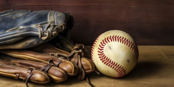 Close up of baseball with glove