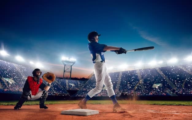 Two men on the field playing baseball with a bat