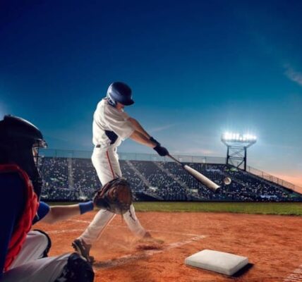 Players Playing Baseball on the Field