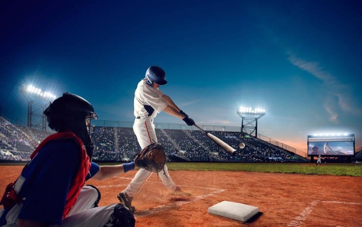 Players Playing Baseball on the Field